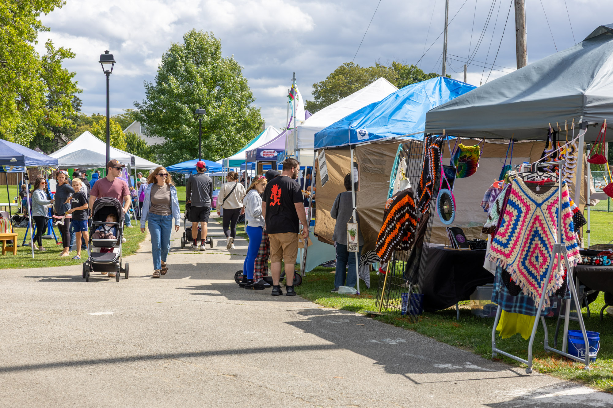 Tents along the Madison Park walkway at the 2025 Lakewood Community Festival.