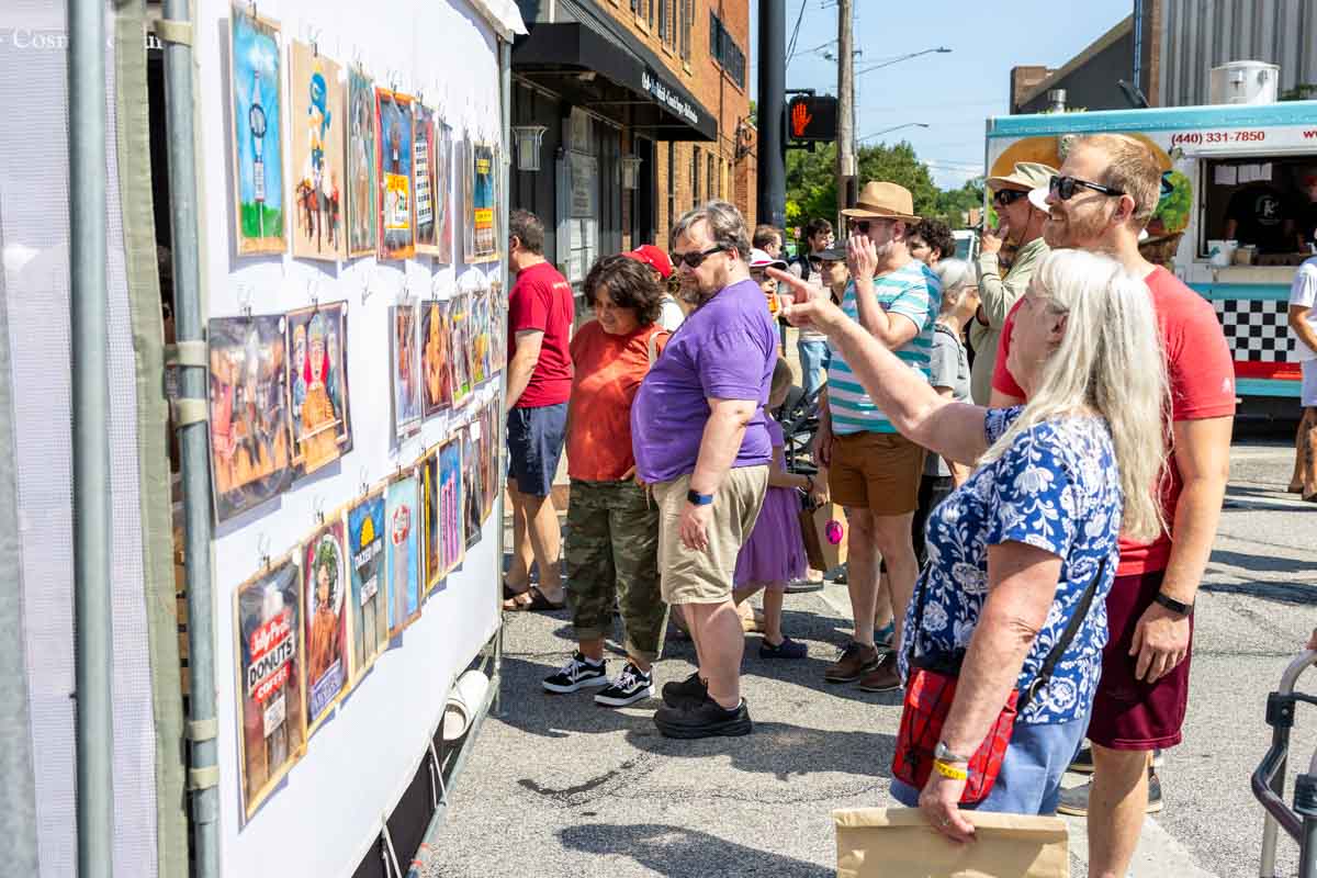 Visitors admire artwork at the 2025 Lakewood Arts Festival.